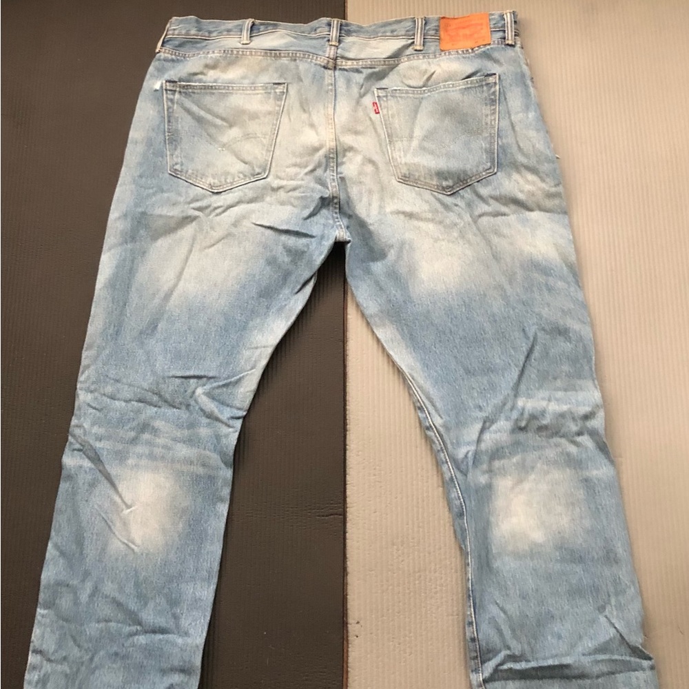 Levis Strauss & Co button fly distressed blue denim jeans